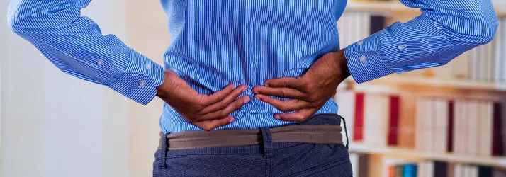 Person experiencing low back pain