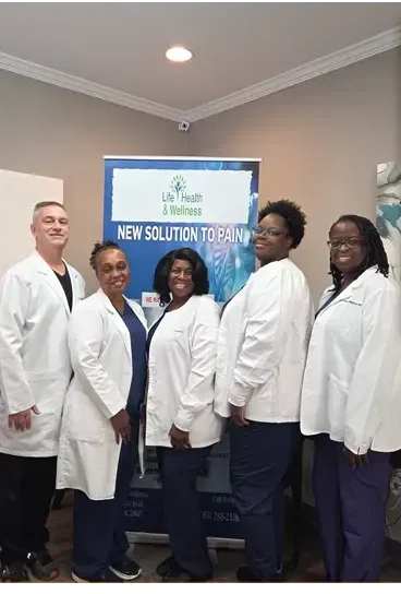 The Life Health & Wellness team in white coats